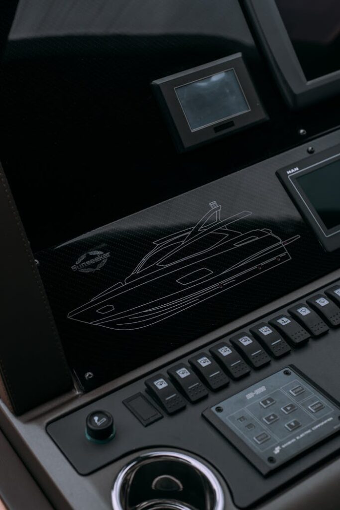 Detailed view of a modern yacht's control panel, showcasing advanced marine technology.